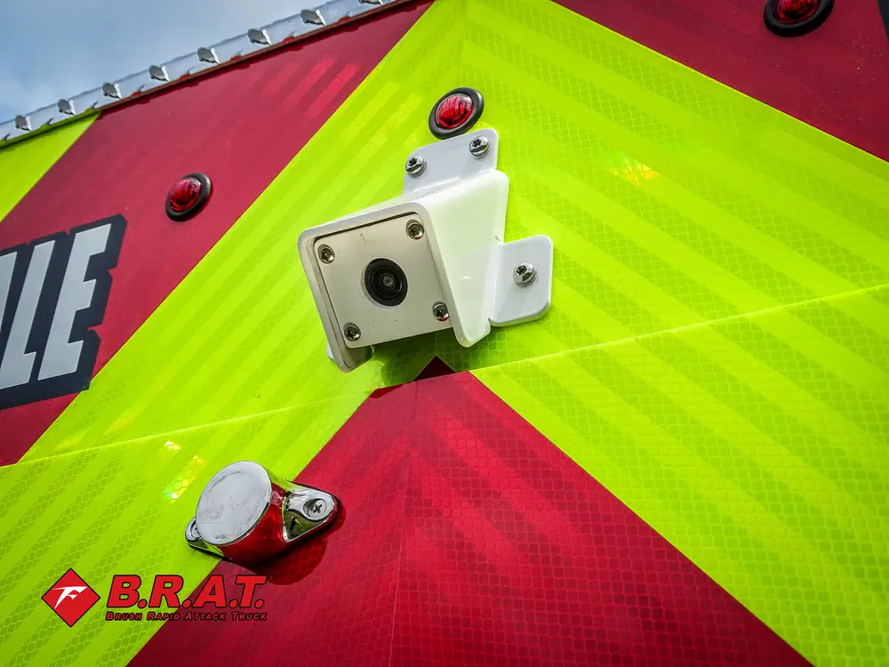 Rear chevron panel close-up with mounted camera or sensor.
