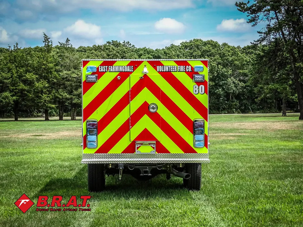 Straight rear view showing full red-yellow chevron panel.