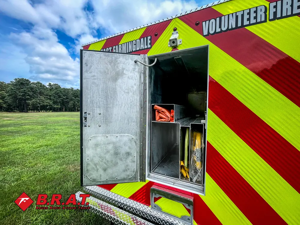 Rear side access compartment open on chevron back panel.