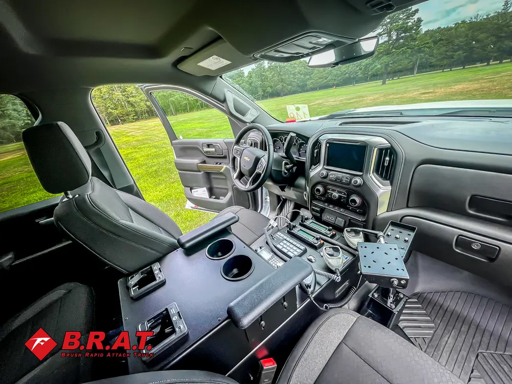 Wide front cabin view with dashboard, seats, and controls.