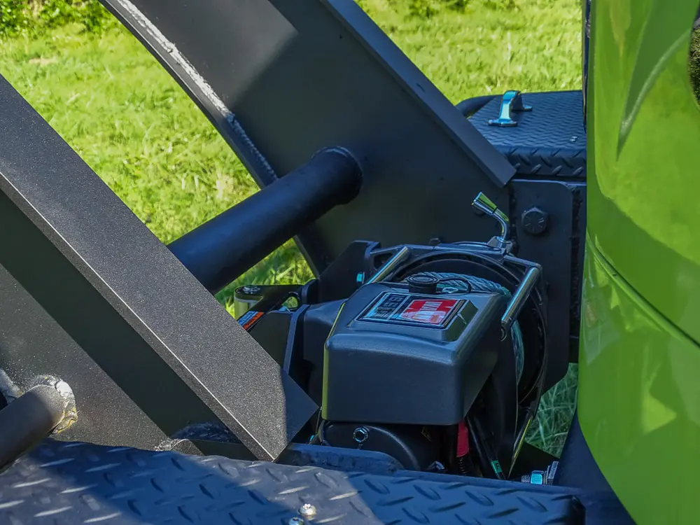 Portable battery pack mounted on rear cage frame.
