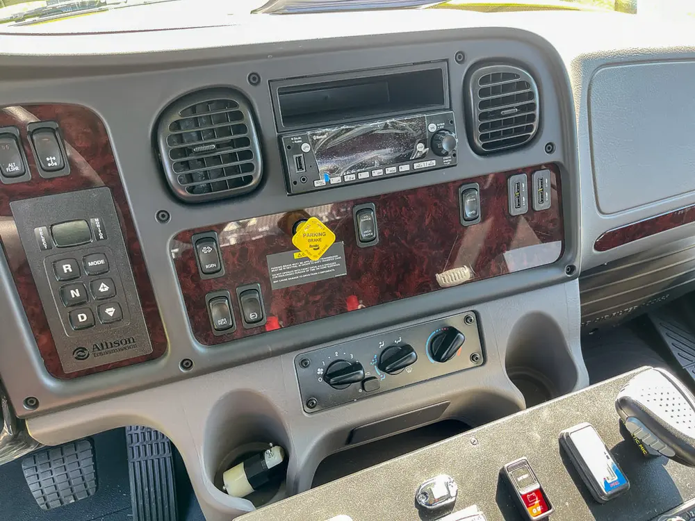 Dashboard controls and climate panel on passenger side.
