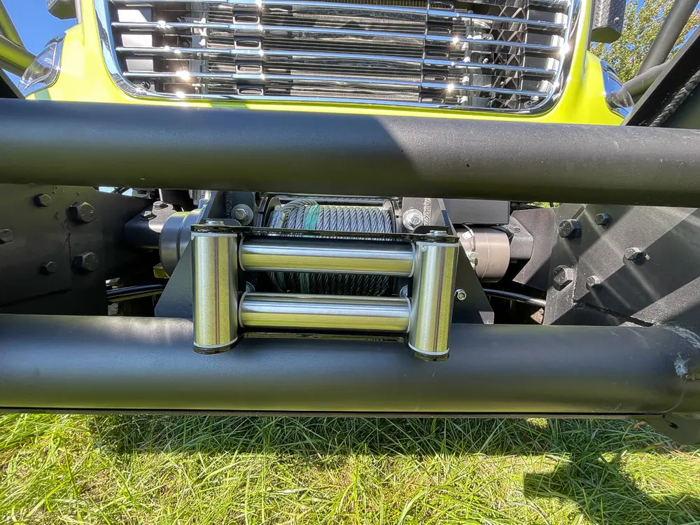 Close-up of winch roller fairlead on front bumper.