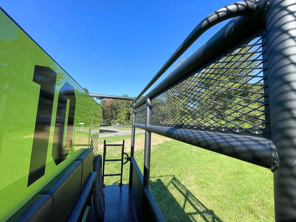 Walkway perspective toward rear ladder and cage opening.