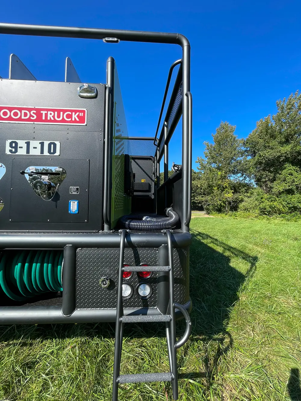 Rear panel and lower hose reel bay from slight angle.