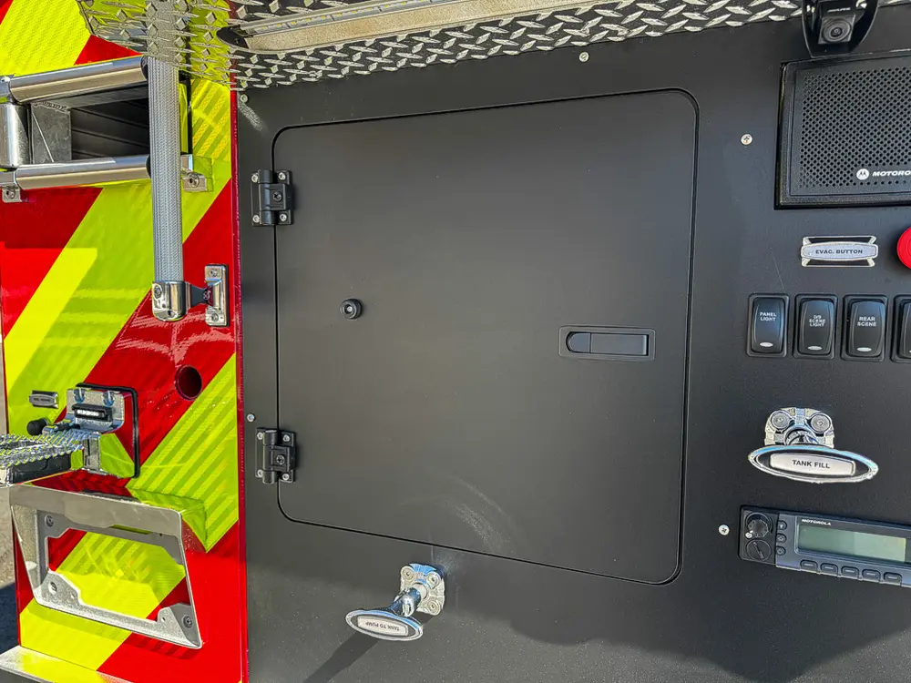 Rear pump panel with large center access door closed.