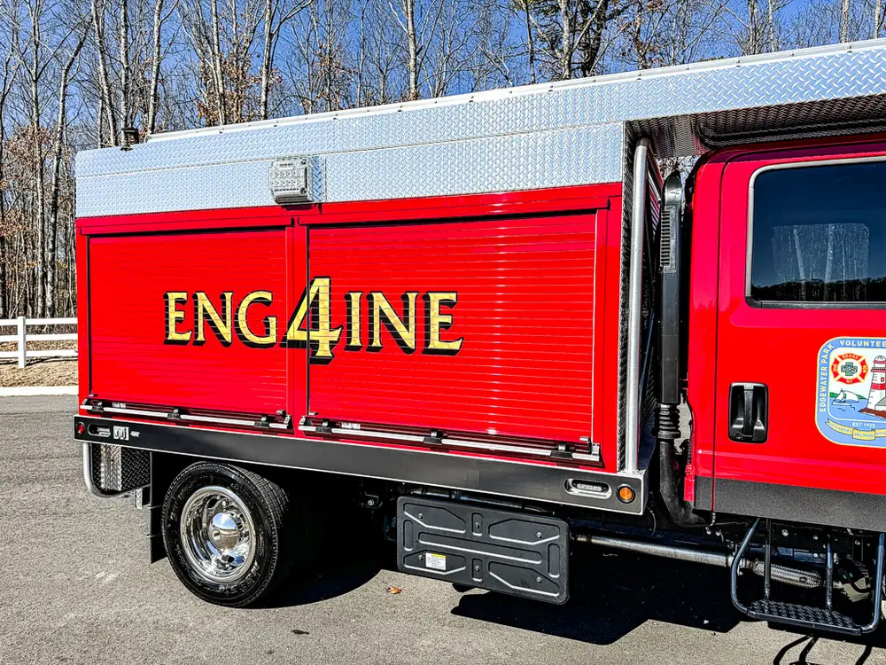 Mid-body side profile showing large ENg4INE lettering.