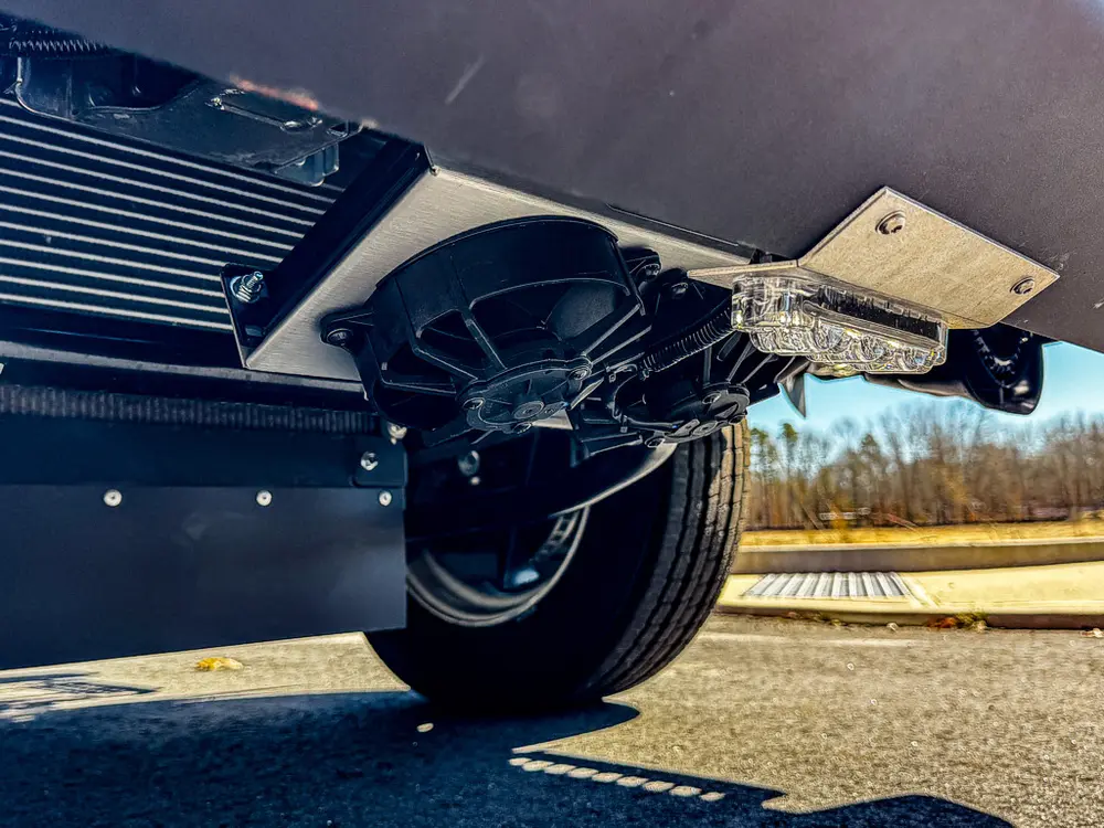 Front underside close-up showing mounted camera and hardware.