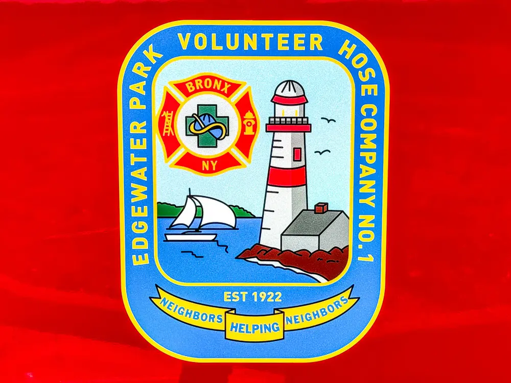 Close-up of Edgewater Park Volunteer Hose Company circular emblem decal.