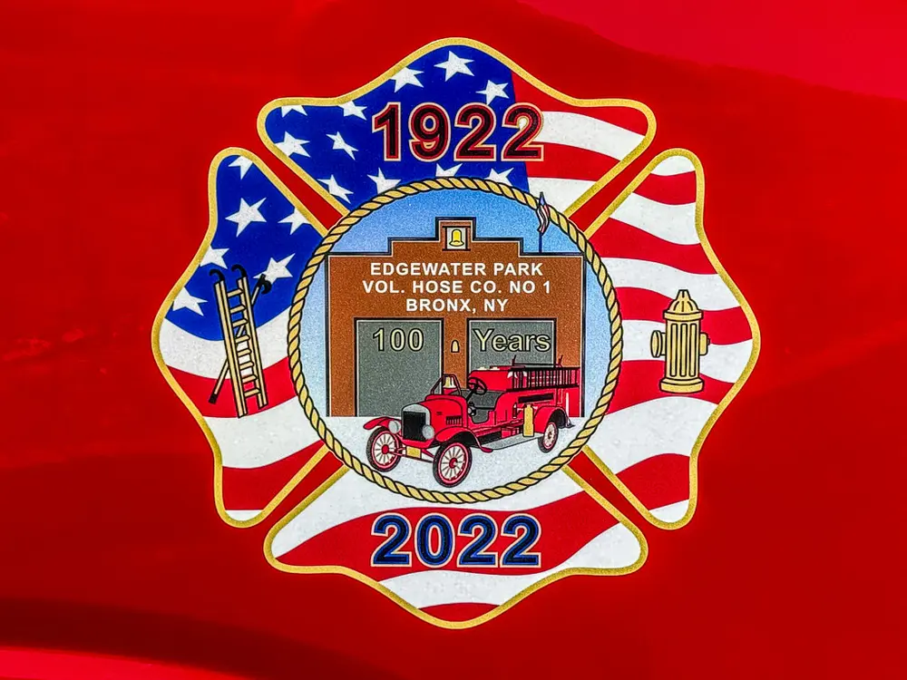 Close-up of commemorative 1922-2022 department shield decal.