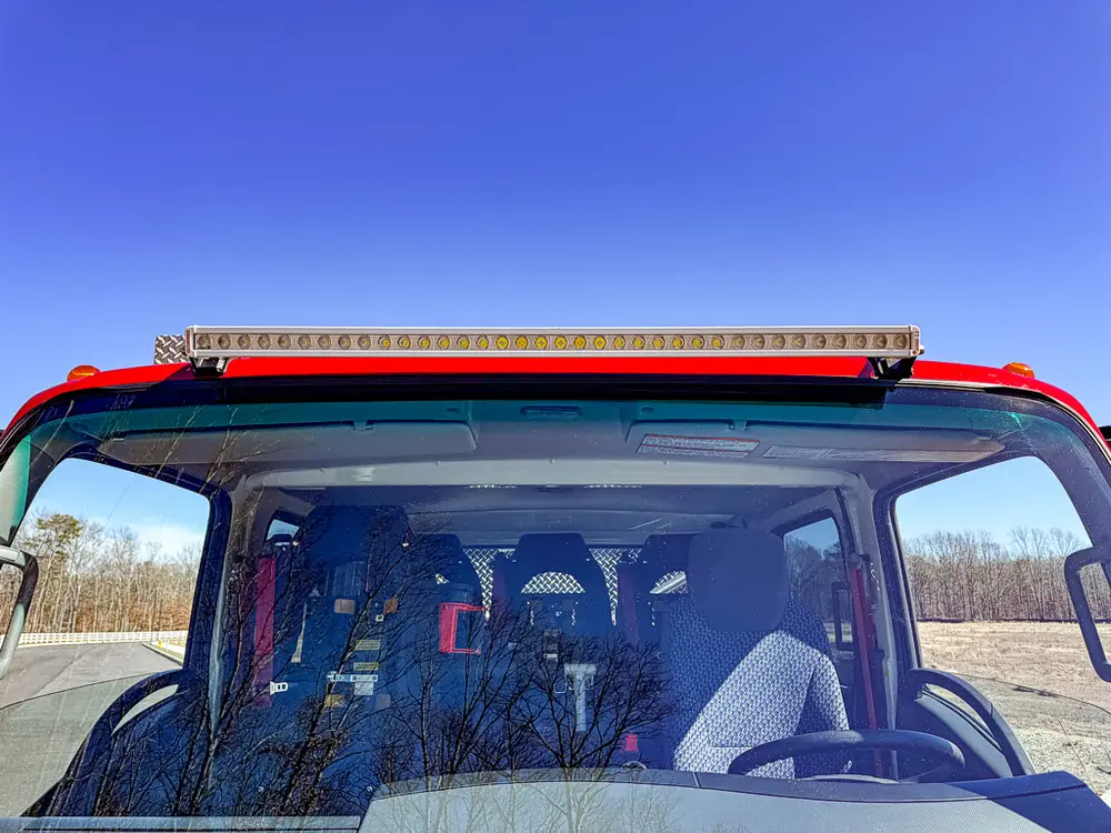 Upper front windshield and roof lightbar close-up.