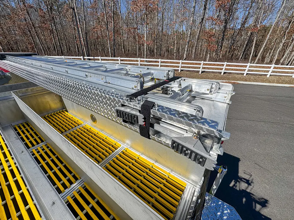 Upper deck angle showing folded ladder rack and rear monitor mount.