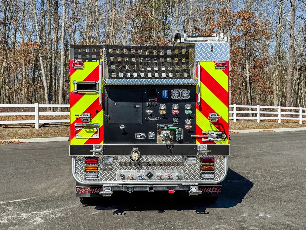 Straight rear view of the pump panel and chevron-striped doors.
