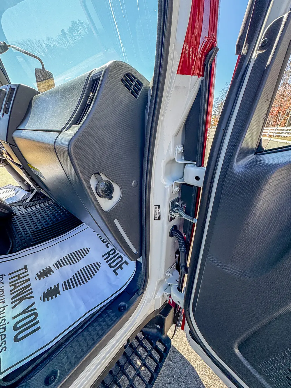 Close-up of interior B-pillar trim and latch area.