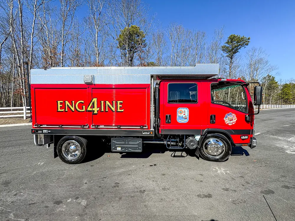 Full left-side profile of the truck body and cab.