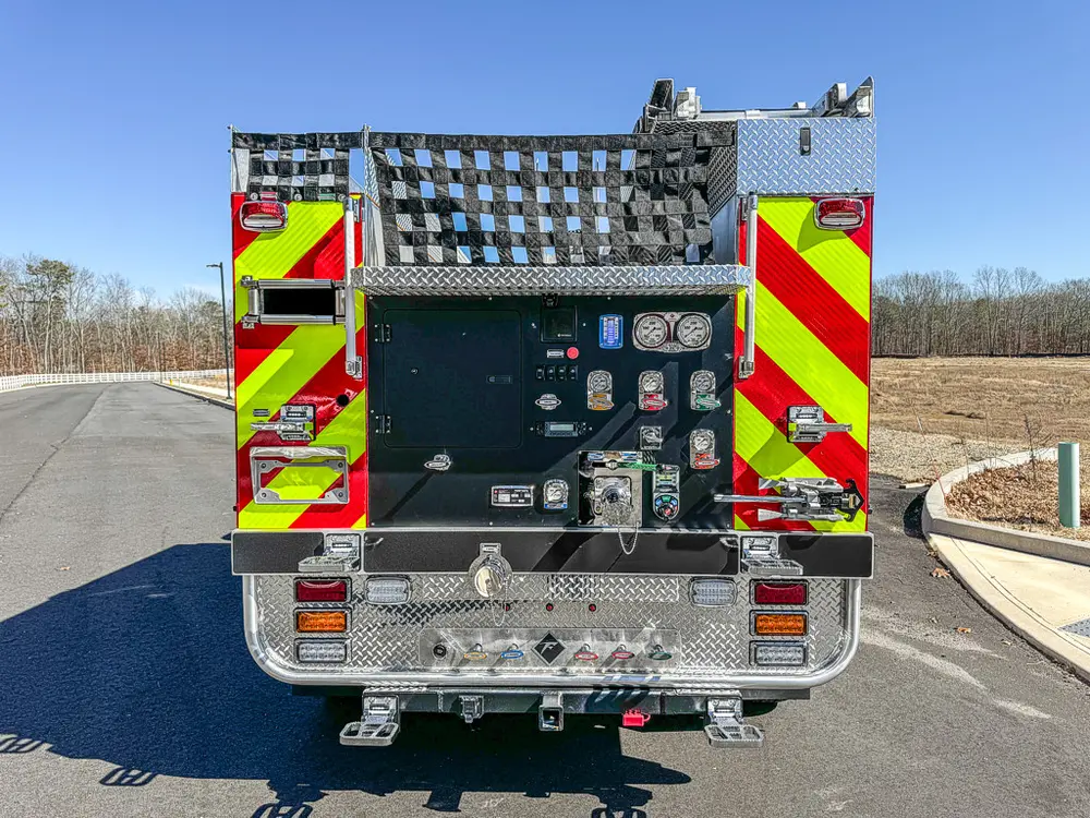Straight rear view showing pump panel and chevron-striped corners.