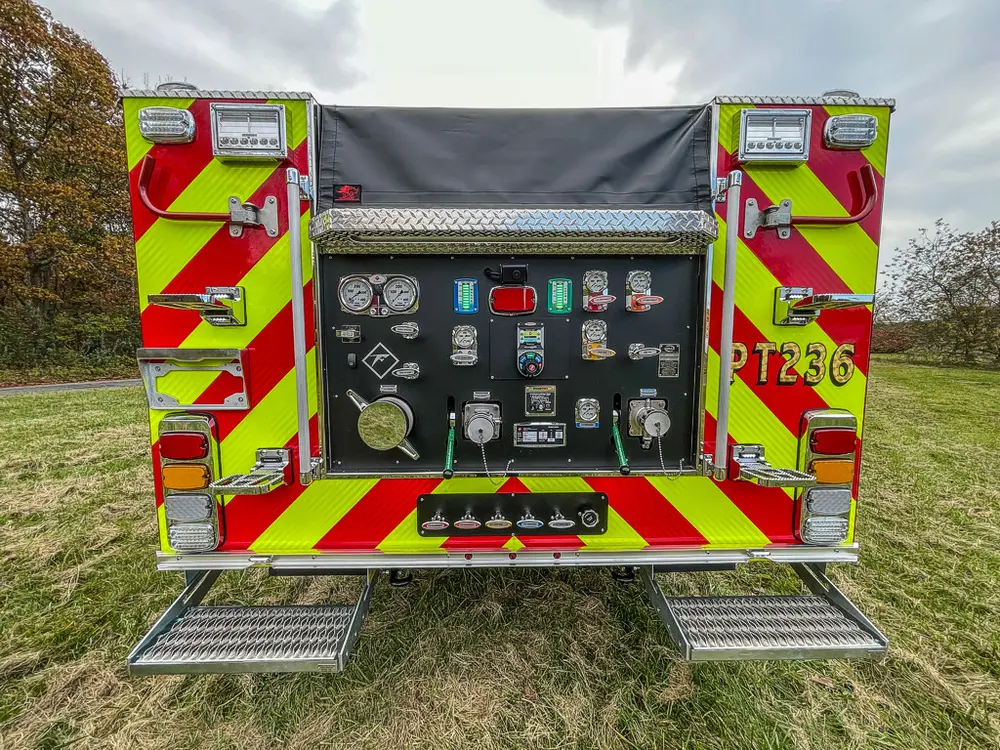 Rear pump panel from lower angle with fold-down step platform.
