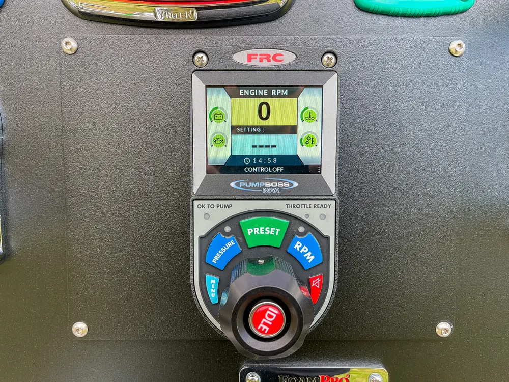 Rear pump controller close-up with digital display and selector dial.