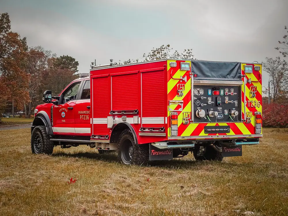 Rear three-quarter passenger-side view with pump panel open.