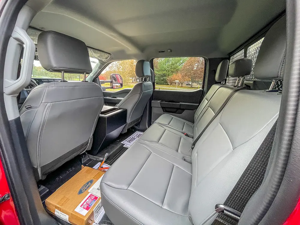Rear seating row and front seatbacks in crew cab.