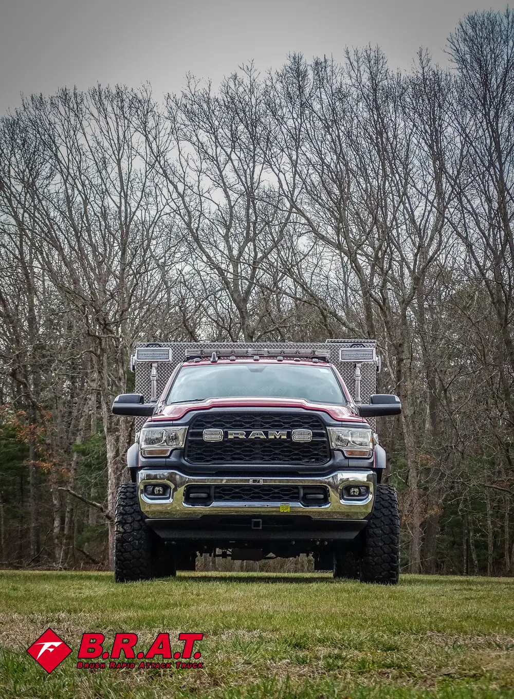 Front view close-up with roof rack and cab visible.