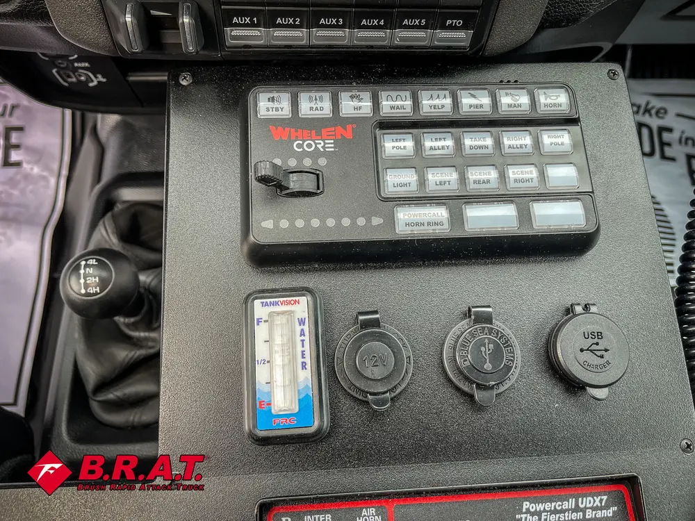 Close-up of lower console with communication keypad and knobs.