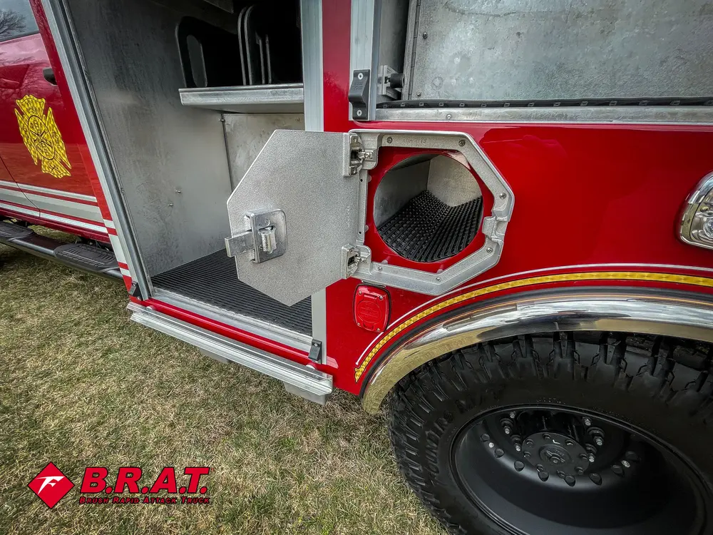 Octagonal side intake hatch open beside lower compartment.