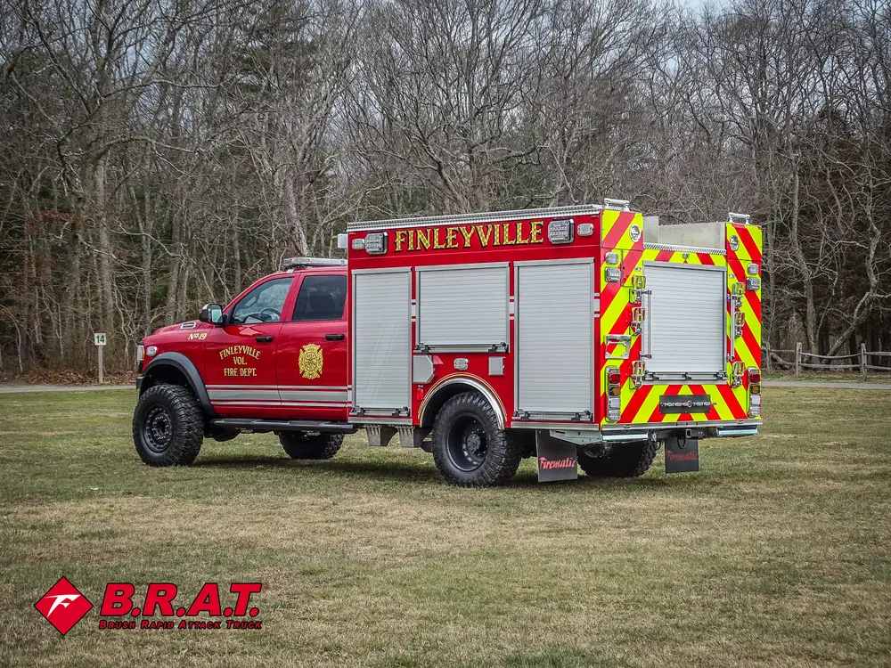 Rear-left three-quarter view with chevron rear panel visible.