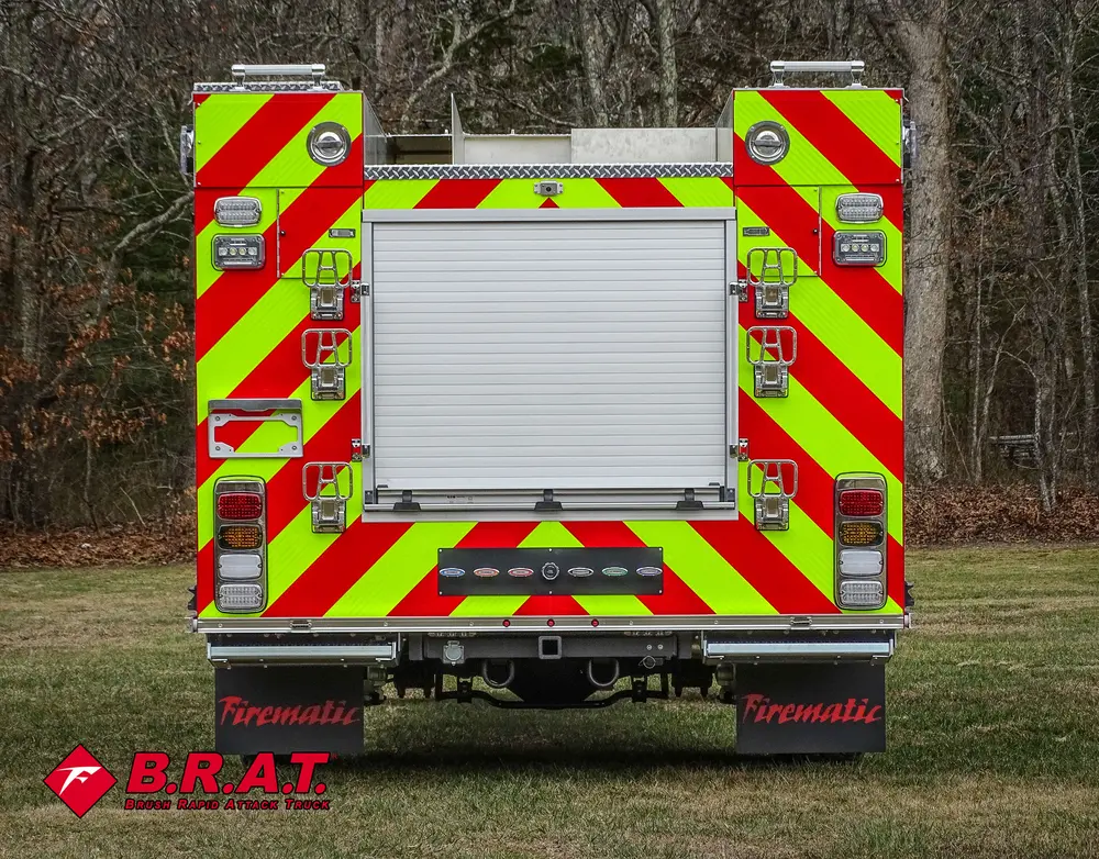 Straight rear view with closed roll-up rear compartment door.