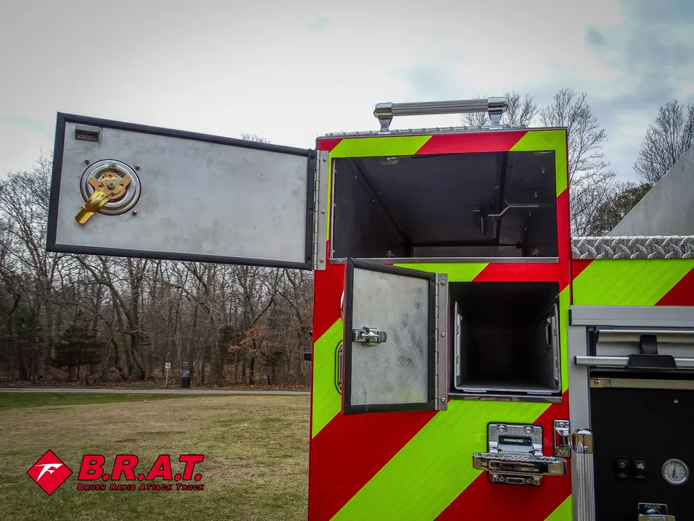 Rear upper compartments open showing deep storage channels.