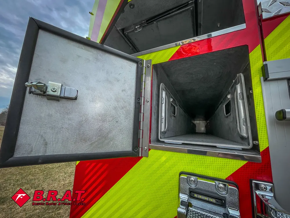 Open tapered side tube compartment with deep interior channel.