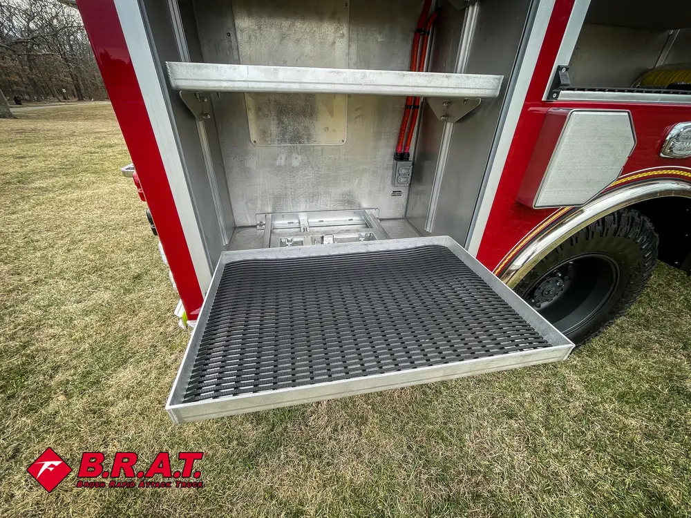 Pull-down tray extended from a lower side compartment.