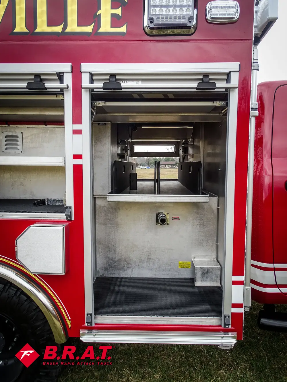 Open side compartment revealing pump area and interior framing.