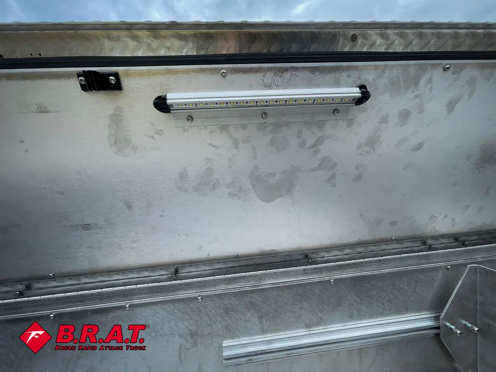 Inside of open top compartment with mounted LED strip light.