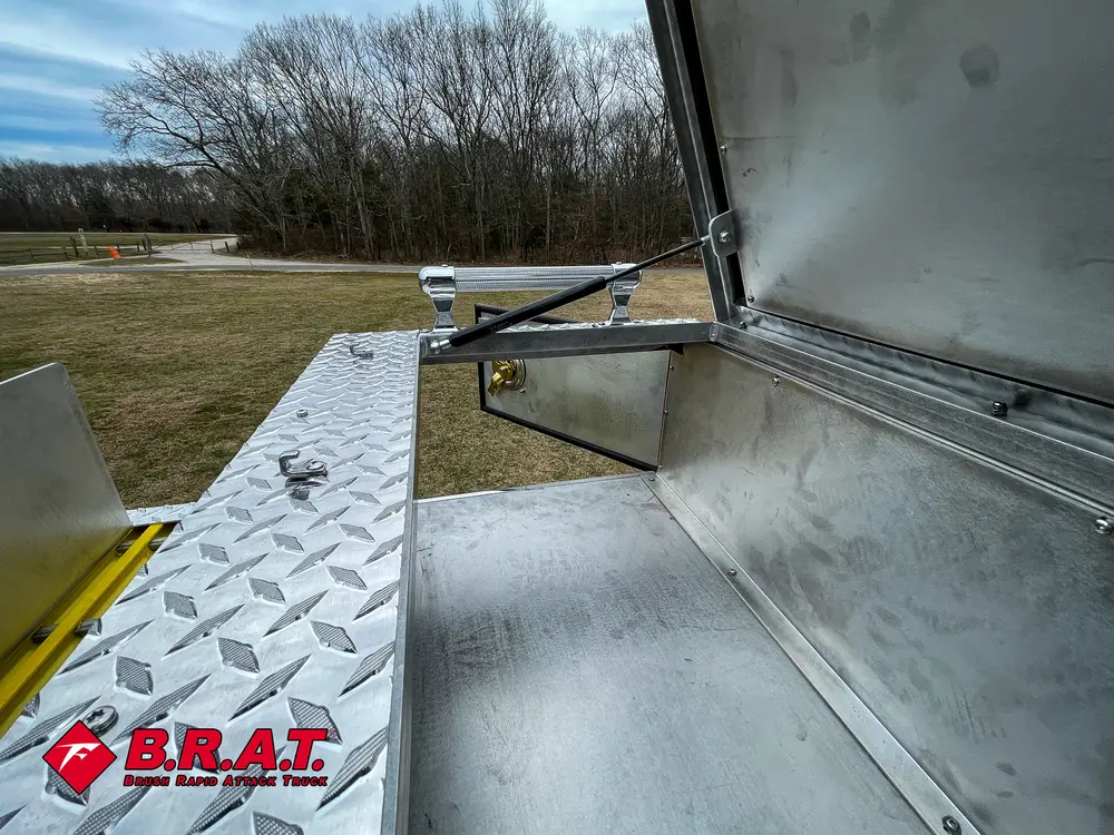 Top compartment viewed toward the front with lid strut visible.