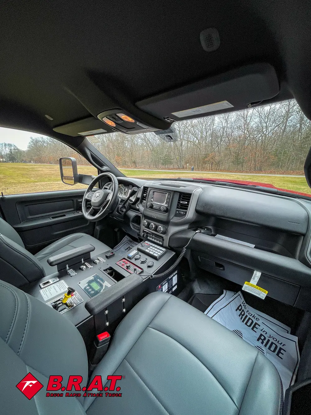Passenger-side interior view showing dashboard and control bank.