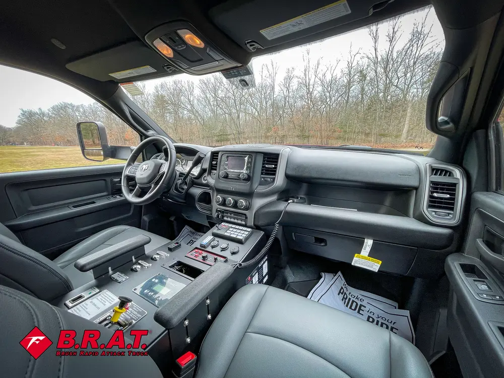 Second interior angle of front cabin with console and switches.