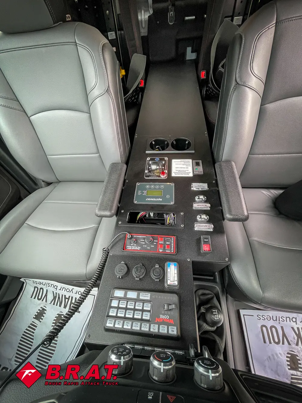 Center console close-up with radio controls and toggle switches.