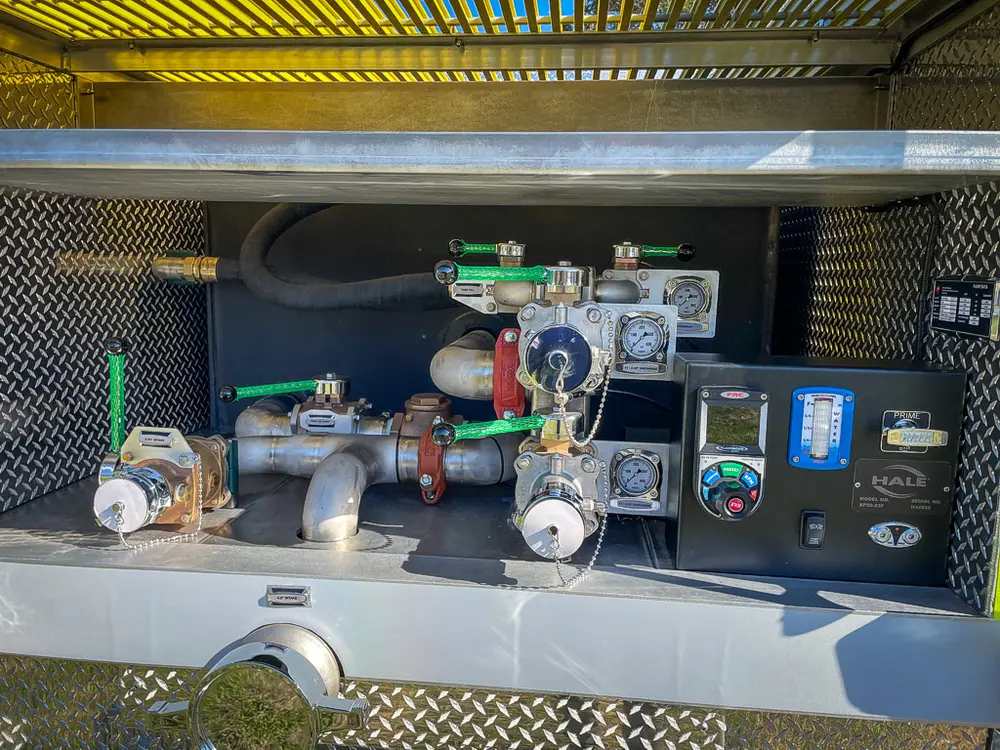 Pump-side close-up with valves, gauges, and controls.