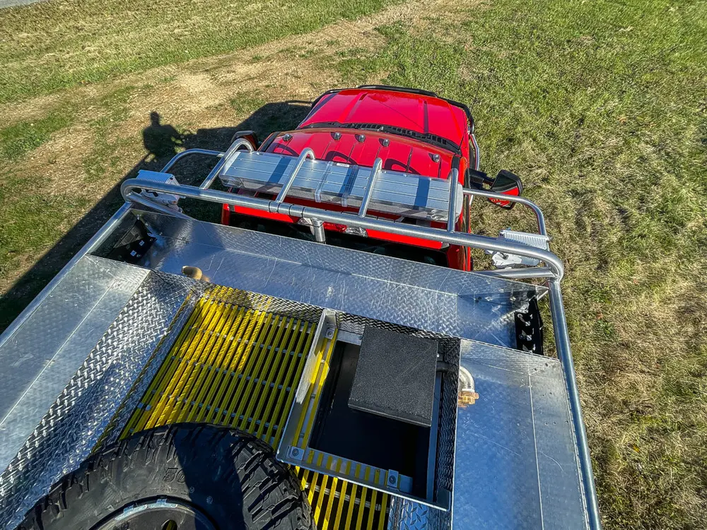 Top deck perspective toward cab roof and side rails.