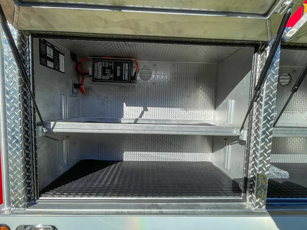 Open side compartment with empty shelf and clean interior.