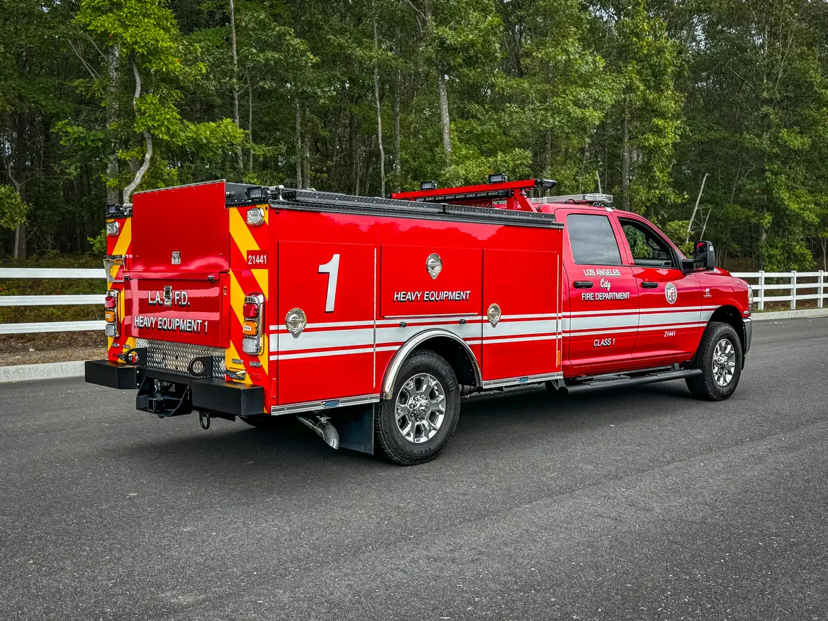 Rear passenger-side three-quarter view with chevron rear panel.