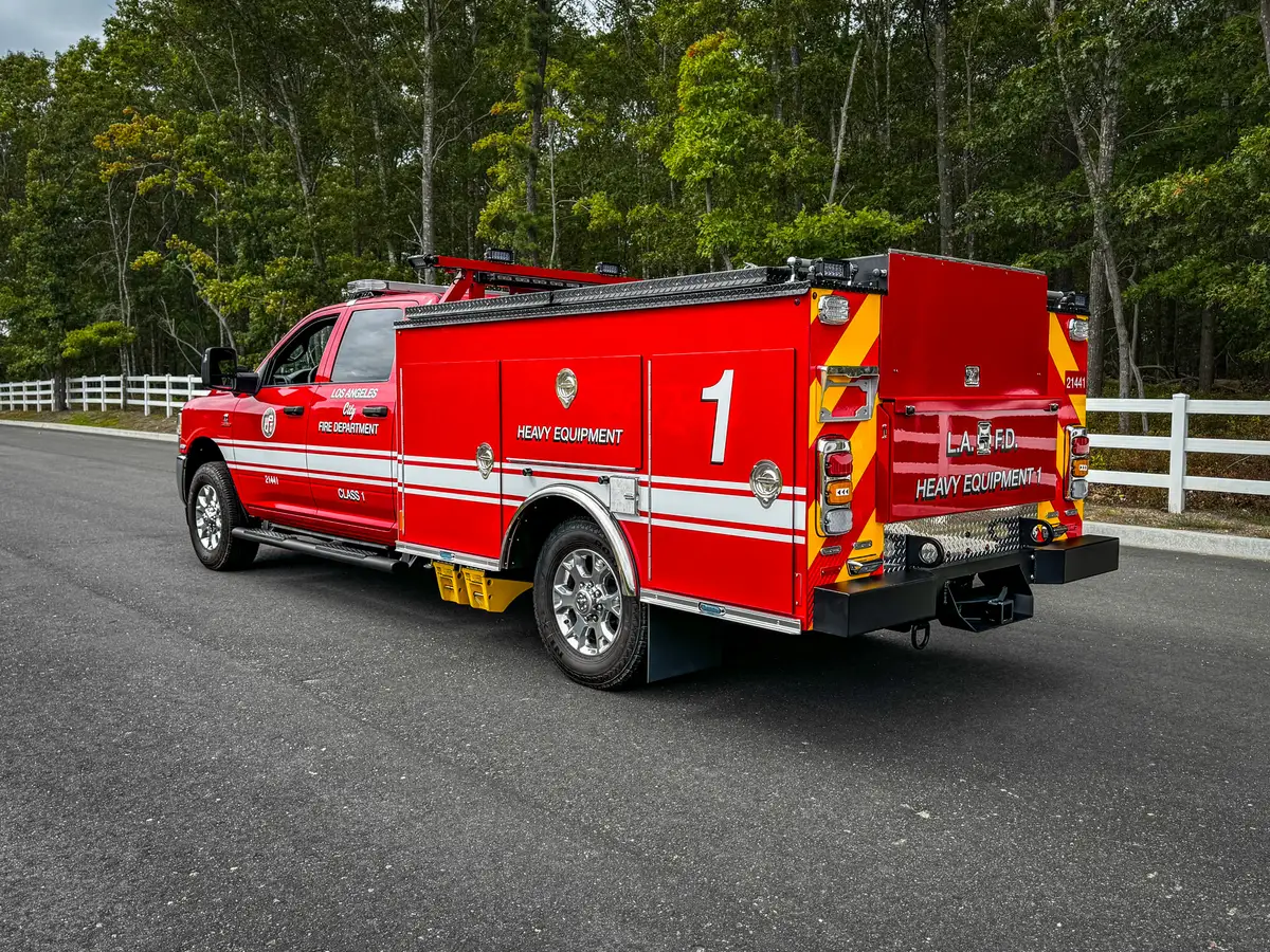 Rear driver-side angle showing side body and rear step.