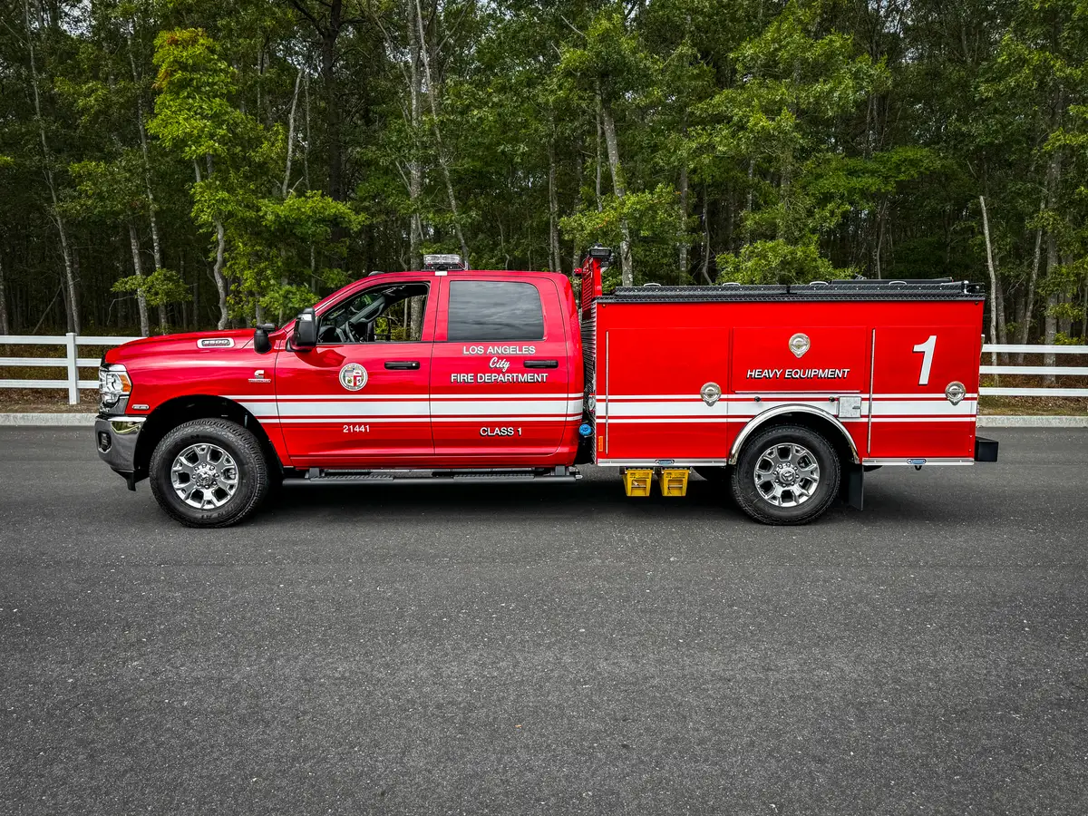 Driver-side profile with compartment doors and unit number 1.