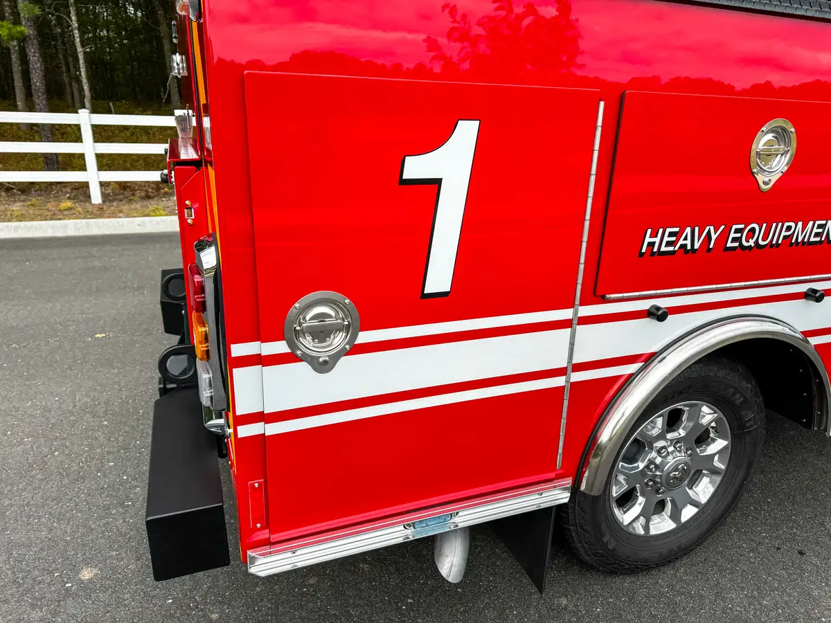 Rear side panel with unit number and closed compartment.