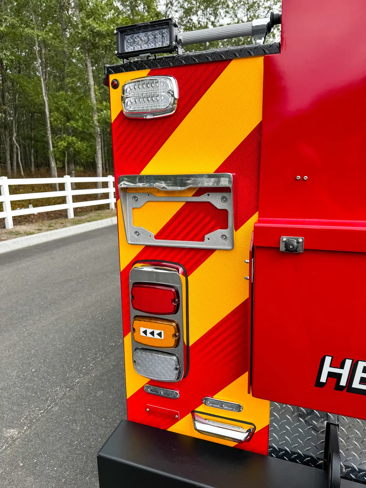 Opposite rear corner taillight and chevron panel detail.