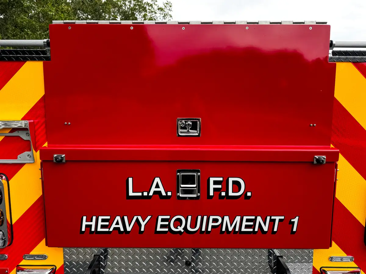 Closed rear tailgate with LAFD heavy equipment text.