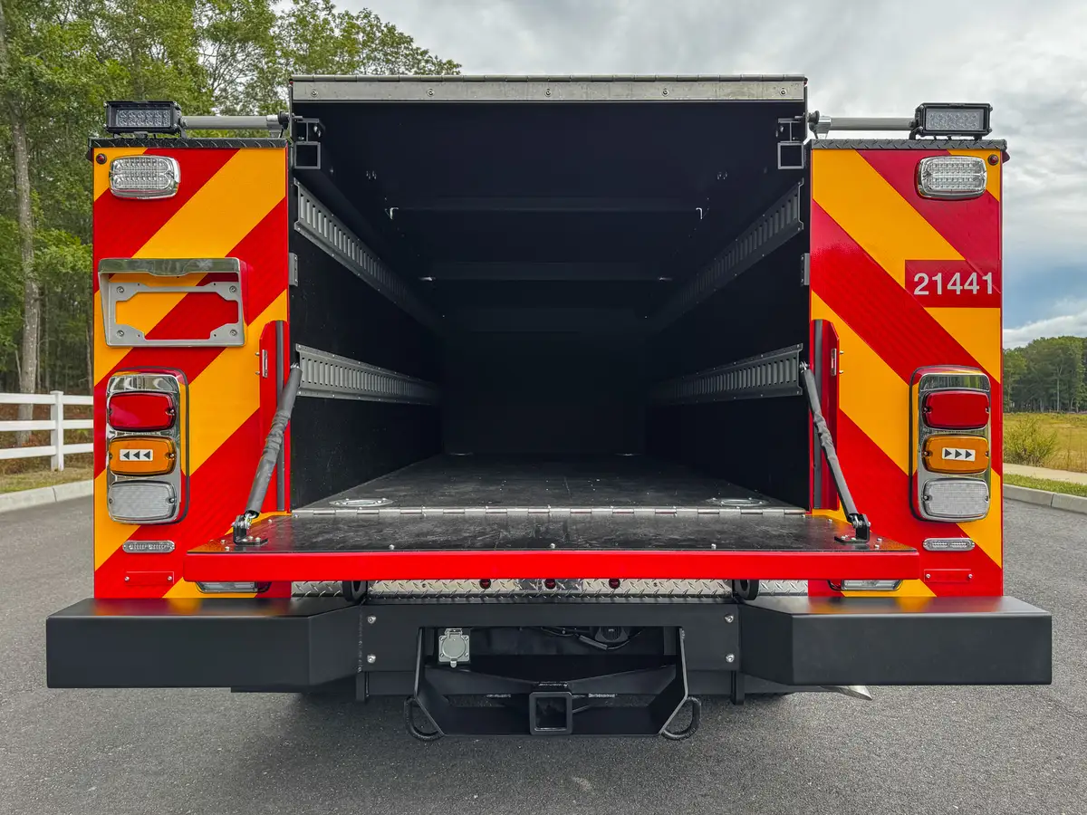 Straight rear view into open rear cargo compartment.