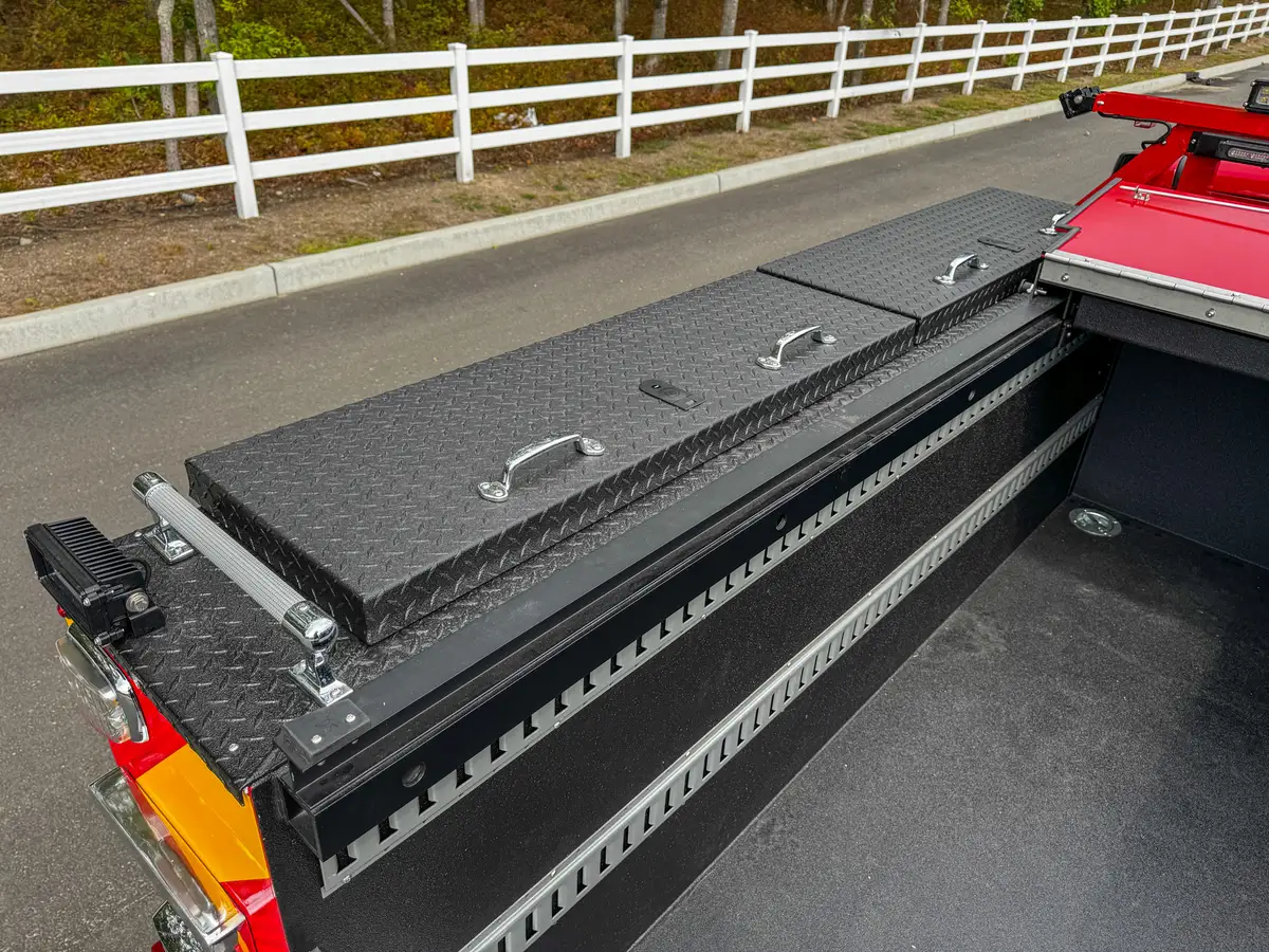 Side rail compartment closed with latches visible.