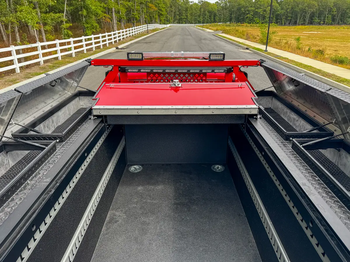 Front bed storage box and surrounding rail channels.